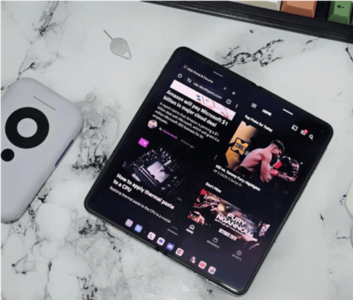 The OnePlus Open foldable phone showcasing its advanced multitasking split screen functionality