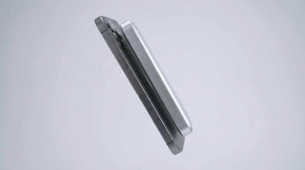 Xiaomi UltraThin Magnetic Power Bank attached to a phone showing ultra-slim profile